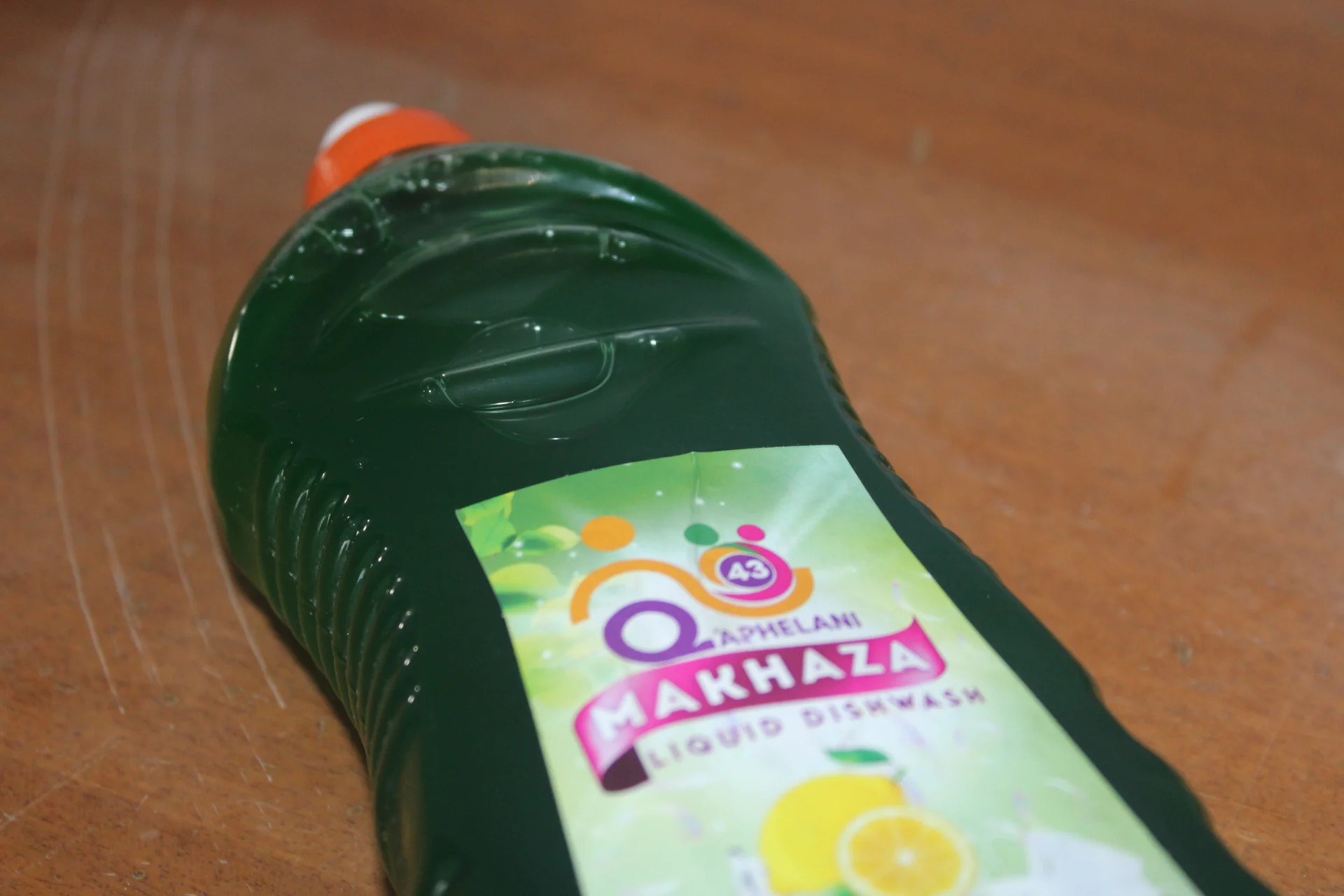 Bottle of Q43 Makhaza Dishwash Liquid on a clean kitchen counter